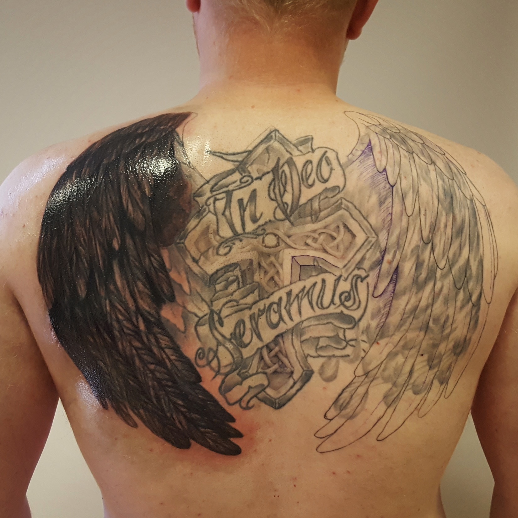 Filling in the wings for a large re-work job. NAOHOA Luxury Bespoke Tattoos, Cardiff, Wales (UK).