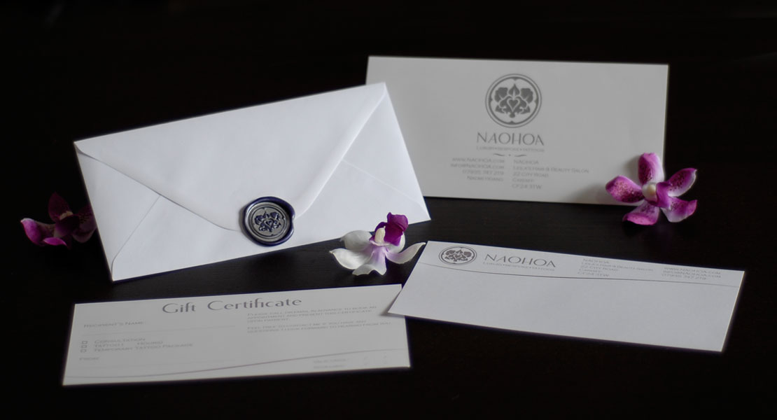 Gift Certificates, personalised note and wax-sealed envelopes available to buy all year round at NAOHOA Luxury Bespoke Tattoos, Cardiff, Wales (UK). A truly unique gift!