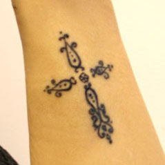 A delicate Christian cross design by Naomi Hoang, NAOHOA Luxury Bespoke Tattoos, Cardiff, Wales (UK).