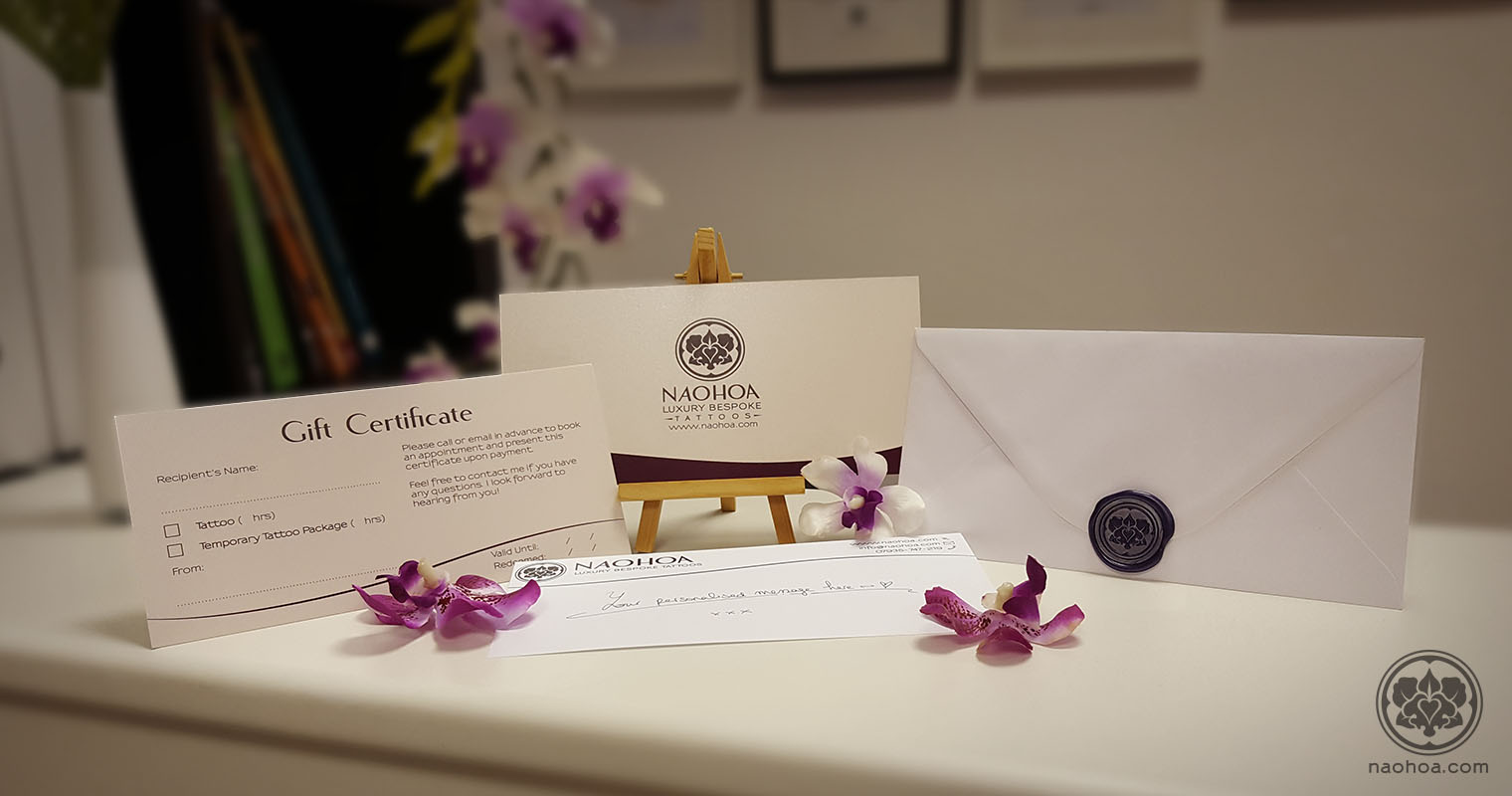 Photograph of Gift Certificates from NAOHOA Luxury Bespoke Tattoos, Cardiff. Founded by Naomi Hoang.