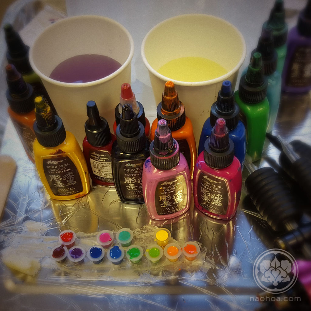 Photo of colourful tattoo inks. Designed and tattooed by female tattoo artist Naomi Hoang at NAOHOA Luxury Bespoke Tattoos, Cardiff (Wales, UK).