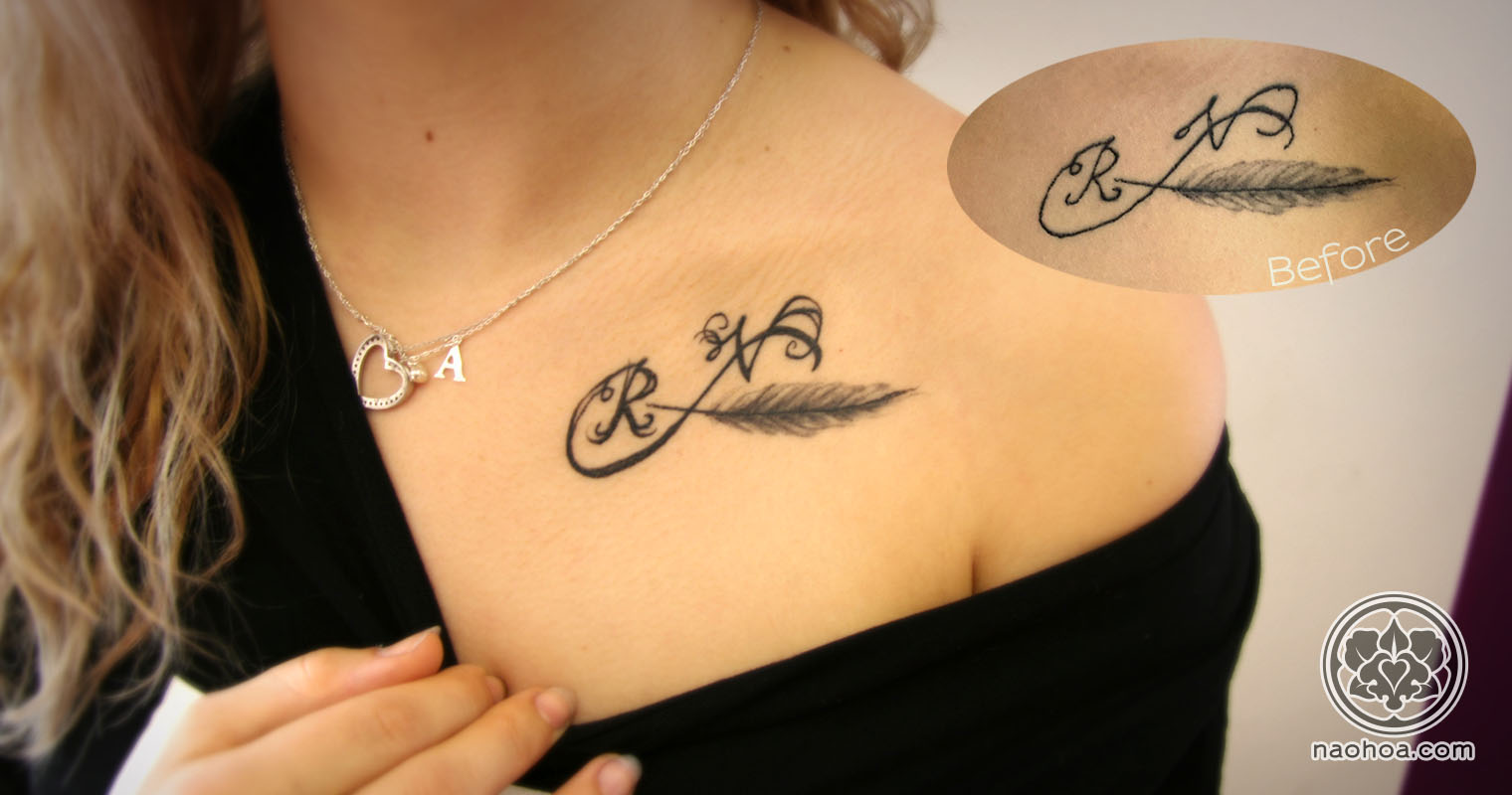 A rework of an existing tattoo to make the initials appear more obvious.