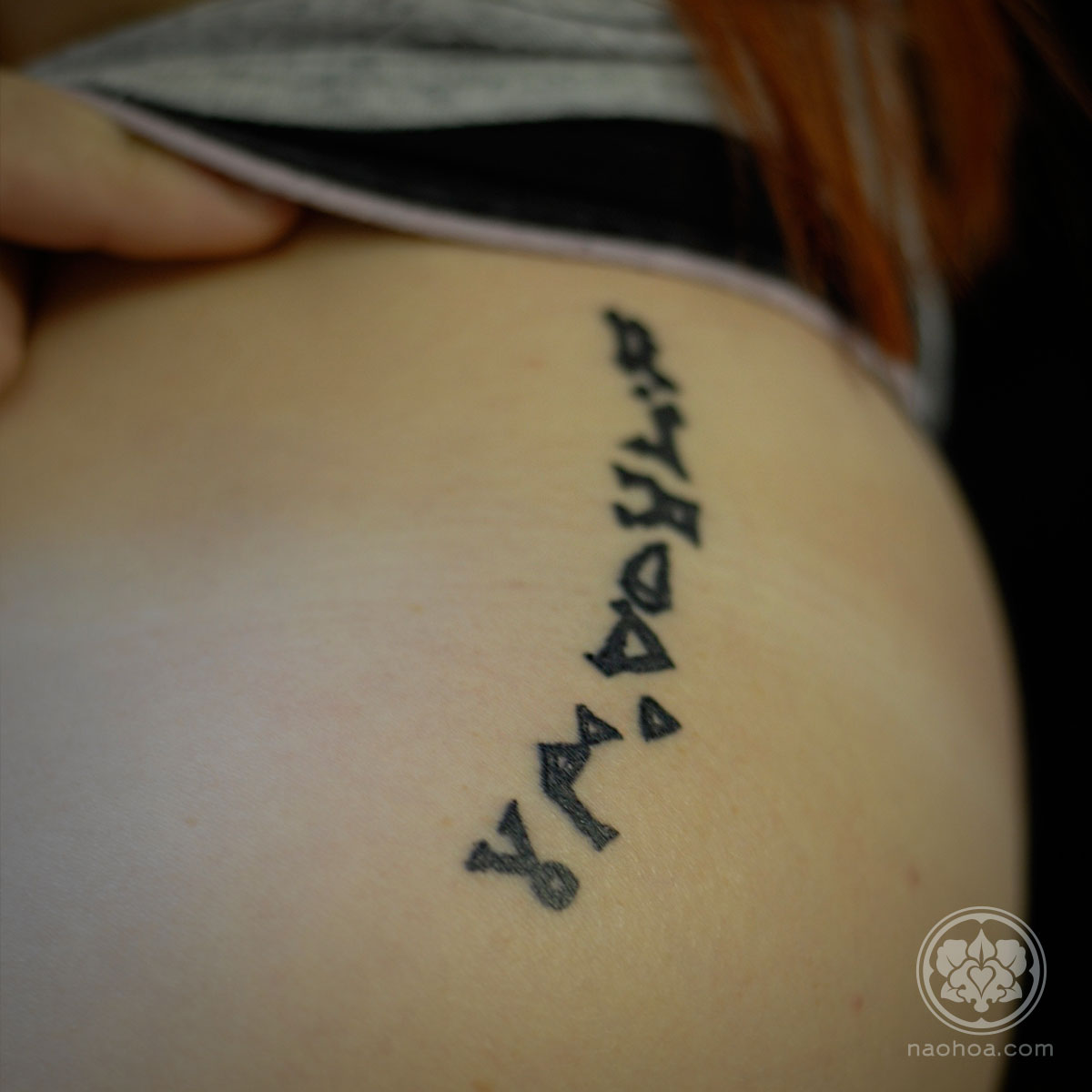 A tattoo of symbols from Stargate by Naomi Hoang, NAOHOA Luxury Bespoke Tattoos, Cardiff, Wales (UK).