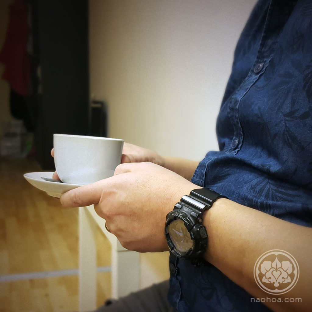 Photo of a client at NAOHOA Luxury Bespoke Tattoos (Cardiff, Wales, UK), drinking Waterloo Tea.